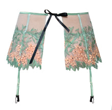 Load image into Gallery viewer, Green and Salmon Floral Embroidered Tulle Garter Belt is practically a flirty skirt; that&#39;s why Carol has nicknamed it the Skelt. Trimmed in shiny elastic, our Skelt is unlined and is fastened in the back with black satin ribbon.   Leg adjustable straps feature rose gold hardware and black clips.  For a set, match this style with our Grace Embroidered Tulle Underwire Bra and the Grace Embroidered Tulle Tanga.  A set made to drop any jaw. 
